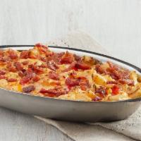 Six Cheese Pimiento Mac with Bacon · Five Cheese Mac with the extra creamy kick of pimiento cheese. Topped with crumbled bacon. (N)