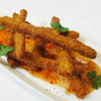 FRIED CALAMARI · Crispy fried calamari steak strips served with sweet chili sauce.