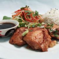 GRILLED CHICKEN · Grilled Marinated chicken thighs served on top of rice and comes with Thai spicy sauce and r...
