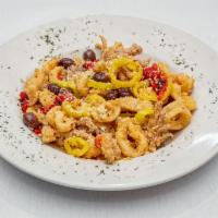 Sicilian Calamari · Served with Kalamata olives, roasted red peppers and banana peppers in a spicy garlic sauce.