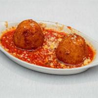 Arancini Risotto Croquettes · Stuffed with rice, peas, and beef served with our marinara sauce.
