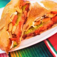 Milanesa de Pollo Torta · Breaded Chicken Traditional Mexican sandwich, served on a telera toasted bread, coated with ...