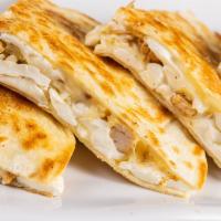 Kids Chicken Quesadilla  · Chicken and cheese quesadilla in a flour tortillas.