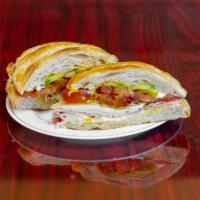 11. Ham & Cheese Croissant · Ham with cheddar cheese on a croissant.