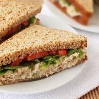 Chicken Salad Sandwich · Includes lettuce, tomato, and choice of dressing.