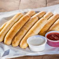  Garlic Stix with Sauce · 6 stix, coated with our homemade garlic butter, seasoned with parmesean cheese and Italian s...