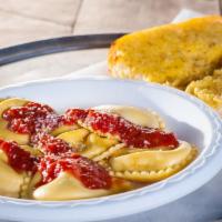 Ravioli · Cheese ravioli, served with your choice of sauce and a side of garlic bread.  Consider custo...