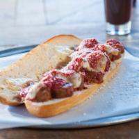 Sausage Parmigiana Hero · Extras are at an additional charge.
