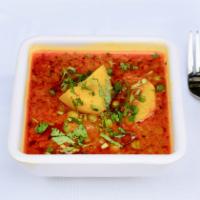 Veggie Aloo Mattar · Fresh potato and green peas cooked with onion, ginger, garlic, tomato and Indian spices. Ser...