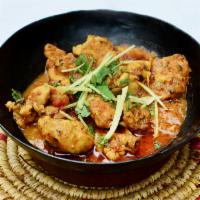 Bone-In Ginger Chicken Karahi · Small pieces of bone-in chicken with house spices, tomatoes, garlic, and ginger, cooked to o...