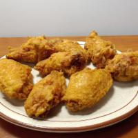 Fried Chicken Wings (8) · Breaded, deep fried wings.