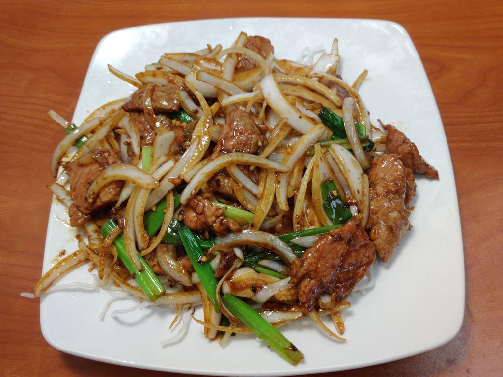 Mongolian Beef · Beef, white onion and green onion.
