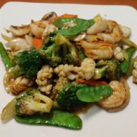 Seafood Delight · Shrimp, scallops, squids, celery, mushroom, carrot, peapod, broccoli and onion.