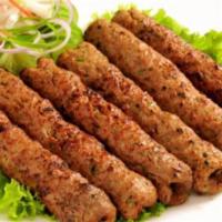 Sheek Kabab · Minced chicken added with spices and herbs perfectly cooked on the grill.