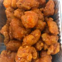Buffalo Shrimp · Our popcorn shrimp tossed in our medium sauce. Served with blue cheese.
