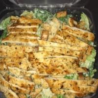 Chicken Caesar Salad · Grilled or crispy chicken, romaine lettuce topped with croutons and Parmesan cheese, dressed...