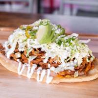 Sope · Thick masa flatbread served with your choice of tradicional meat, pinto beans, salsa verde, ...