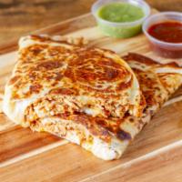 Quesadilla · Flour tortilla, chihuahua cheese and your choice of tradicional meat. Served with poblano cr...