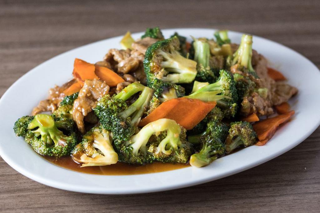 Broccoli Beef · Beef stir-fried with Broccoli and carrots in our house brown sauce.
