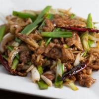 Mongolian Beef · Beef stir-fried with onions and scallions in spicy Mongolian sauce.