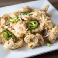 Salt 'n Pepper Chicken · Lightly battered and deep fried, then wok-baked with jalapenos and onions in a special blend...