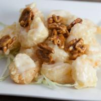 Honey Glazed Walnut Shrimp · Lightly battered, fried, then glazed with our signature honey sauce, and topped with candied...