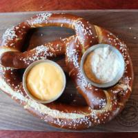 Bavarian Pretzel · Jumbo pretzel served with house-made beer cheese and creamy mustard dipping sauce. 