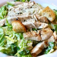 Grilled Chicken Caesar Salad · Romaine hearts, Parmesan cheese and housemade Caesar dressing topped with grilled chicken an...