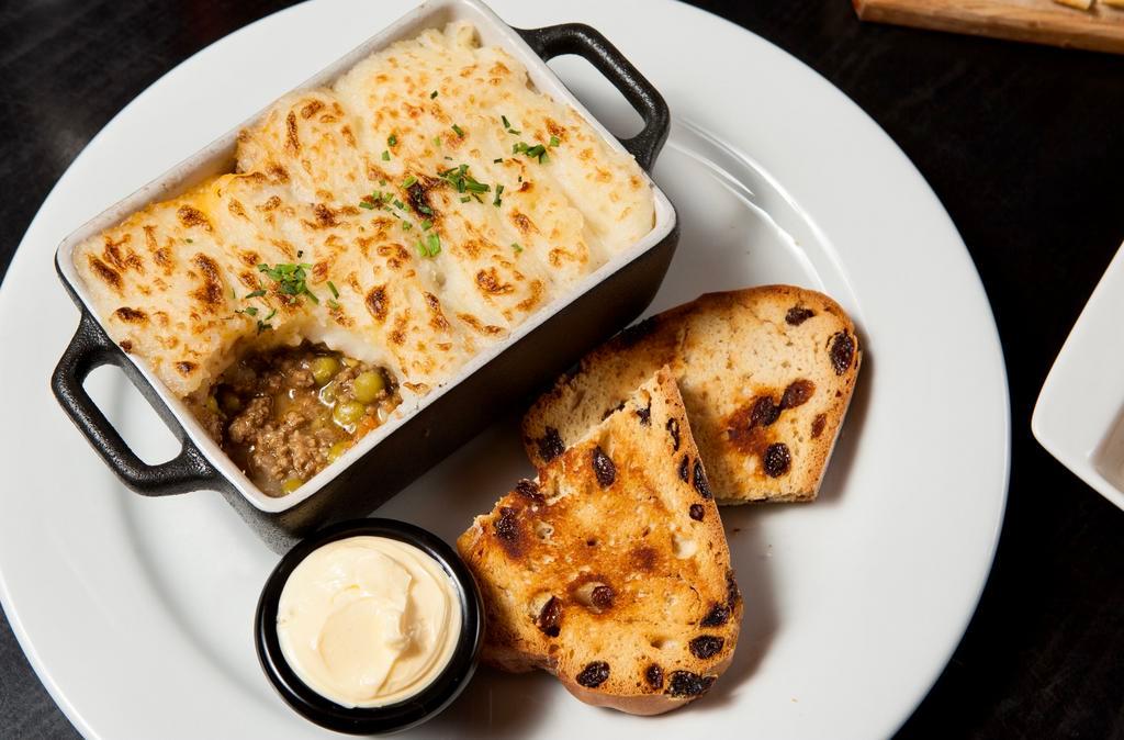 Shepherds Pie · Ground beef mixed with an array of vegetables and topped with our house-made mashed potatoes baked golden brown. Irish Soda bread.
