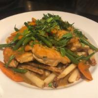 Chicken Curry · Sauteed chicken tenders, carrots, green beans in curry sauce over french fries. 
