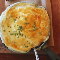 Chicken Pot Pie · Traditional chicken pot pie with an array of vegetables topped with puff pastry and served w...