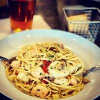 Fettuccini Cajun Shrimp · Sauteed shrimp with garlic, olive oil, and Cajun spice Louisiana style.