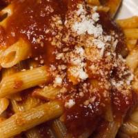 Pasta with Marinara Sauce · Light, meatless tomato sauce.