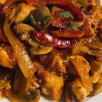 Chicken Cacciatore · Tender pieces of chicken with mushrooms, onions, green and red peppers in a light tomato sau...