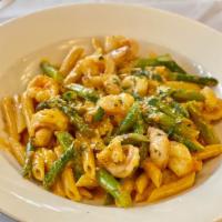 Shrimp Paradiso · Shrimp, penne pasta and asparagus tossed in a vodka sauce with Romano cheese.  A LOsteria fa...