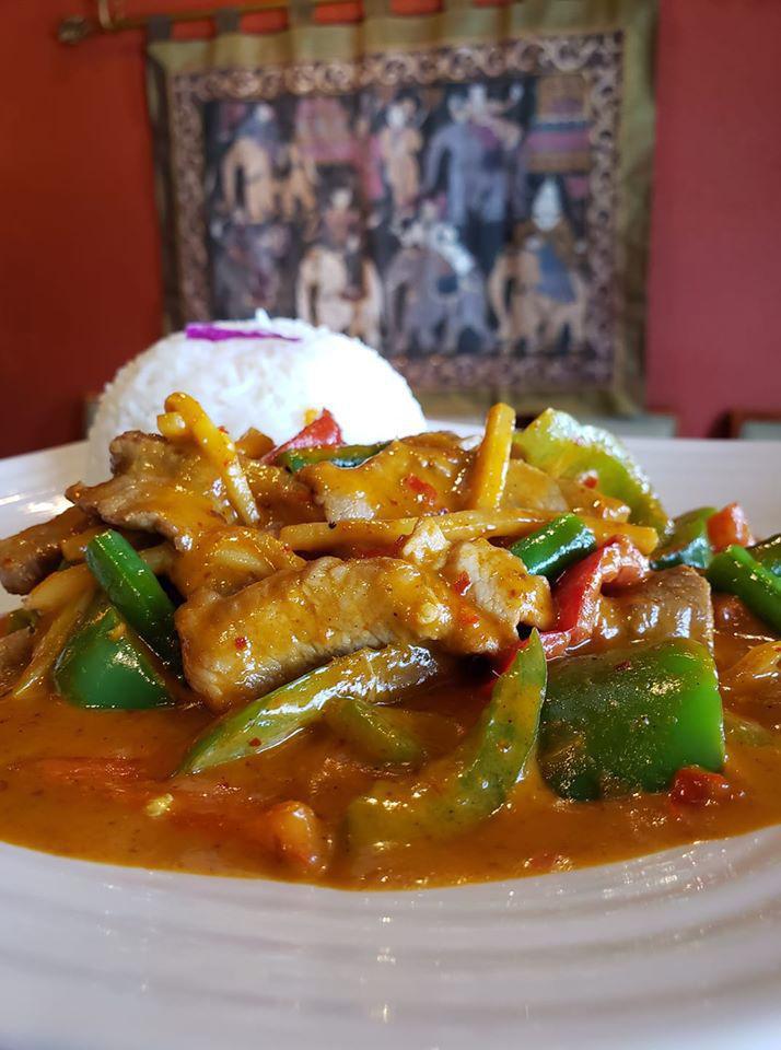 Pad Ped Catfish · Filet catfish with red curry sauce, green beans, red and green bell peppers, bamboo shoots and onions. Come with a side of steamed jasmine rice.