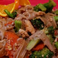 Pad See-Ew · Flat rice noodles with carrots, broccoli and our special sauce.