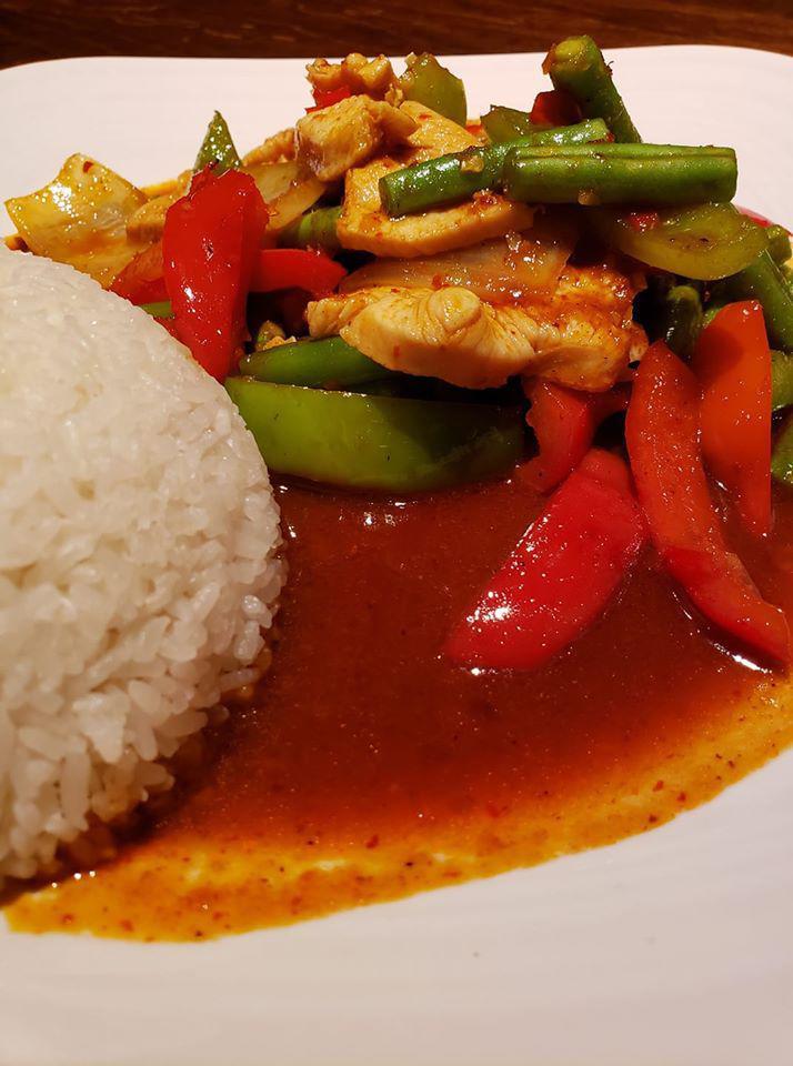 Thai Chili Stir-fry · Sweet and spicy sauce, green beans, chili, red and green bell peppers, onions and your choice of protein. Come with a side of steamed jasmine rice.
