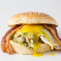 No. 5 - Sunny-Side Burger · 100% Grassfed Beef, pasture-raised bacon, pepperjack cheese, sunny-side up egg, salsa verde.