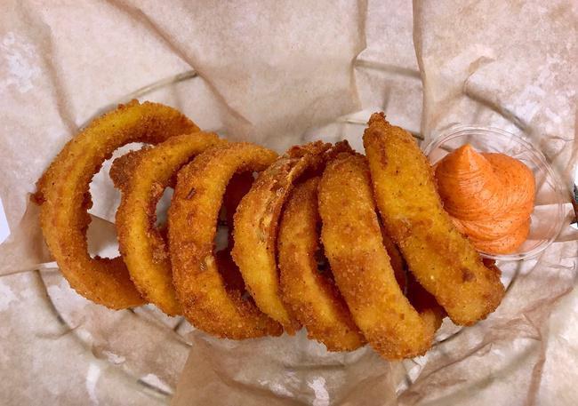 Panko Breaded Onion Rings · Panko breaded onion rings with a side of our smoked paprika mayo.