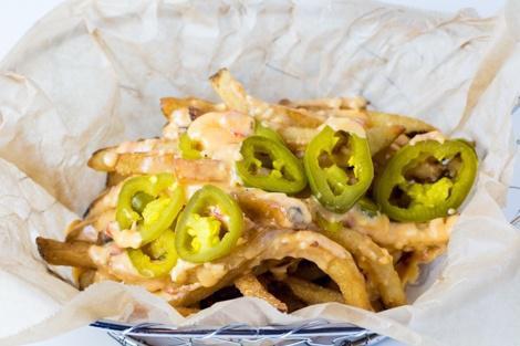 Pimento Cheese Fries · Our crispy hand-cut fries topped with melted pimento cheese and pickled jalapeños.
