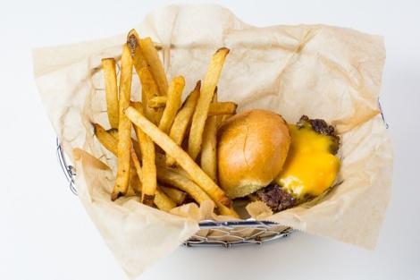 Lil Cheeseburger Meal · 100% grassfed beef burger topped with Tillamook yellow cheddar. Served with fries OR fruit & veggie cup with sunflower butter dip and a drink.