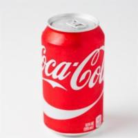 Coca-Cola Classic · Can of ice cold Coca-Cola Classic