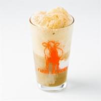 Root Beer Float · Refreshing draft root beer fizzing atop a heaping scoop of vanilla ice cream. An American cl...