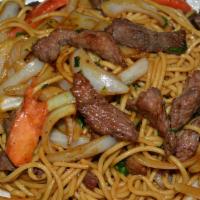 10. Tallarin Saltado Criollo de Res · Sauteed beef with spagetti, onions, tomatoes, pepper and soy sauce.