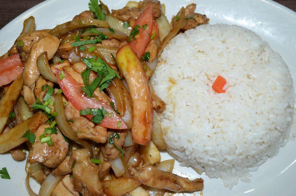 12. Lomo Saltado de Pollo con Arroz · Sauteed slice chicken with onions, tomatoes and french fries served with rice.