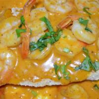 27. Filete de Pescado en Salsa de Camarones · Fish fillet with shrimp.