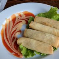 Crazy Crab Roll (4) · Imitation crab meat with cream cheese, scallion, wrapped in eggroll shell fried to a golden ...