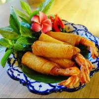 Gong Tod (5) · Shrimp and bacon wrapped in egg roll shell fried to a golden crisp served with spicy mayo sa...
