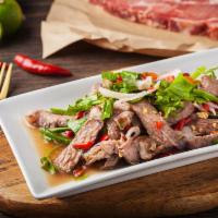 Grilled Beef Salad · Grilled beef with chilies and lime juice, Tomato red onion, cucumber, green onion, cilantro,...